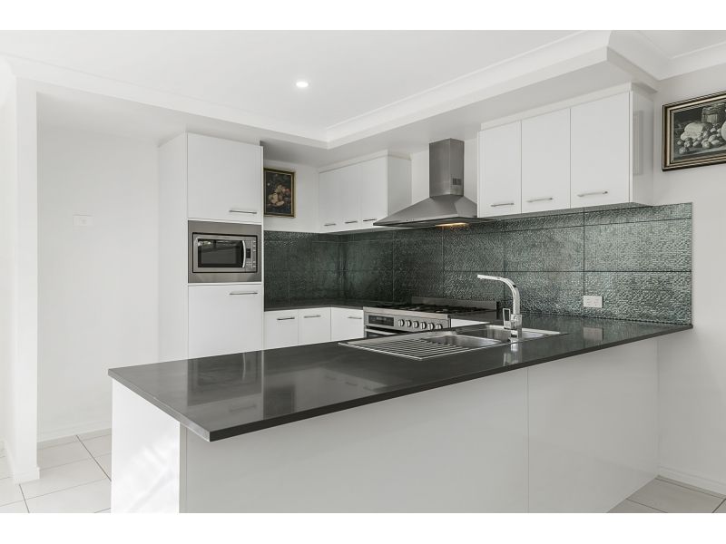 As new, fully established 4 bedroom home with all the features you and your family will love - nothing to do - just move in.