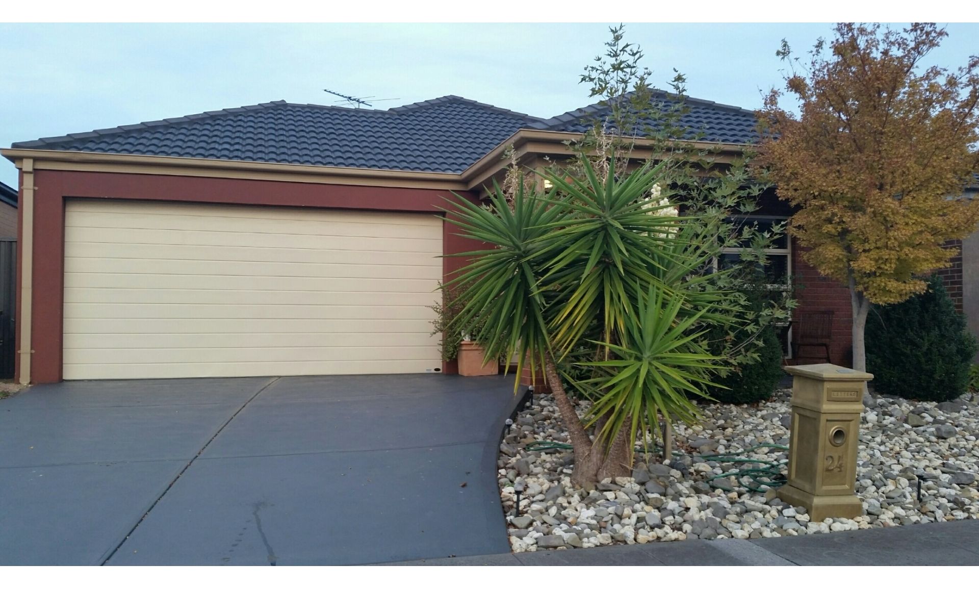 Lakeside home with entertainment area, outdoor spa plus low maintenance garden!!