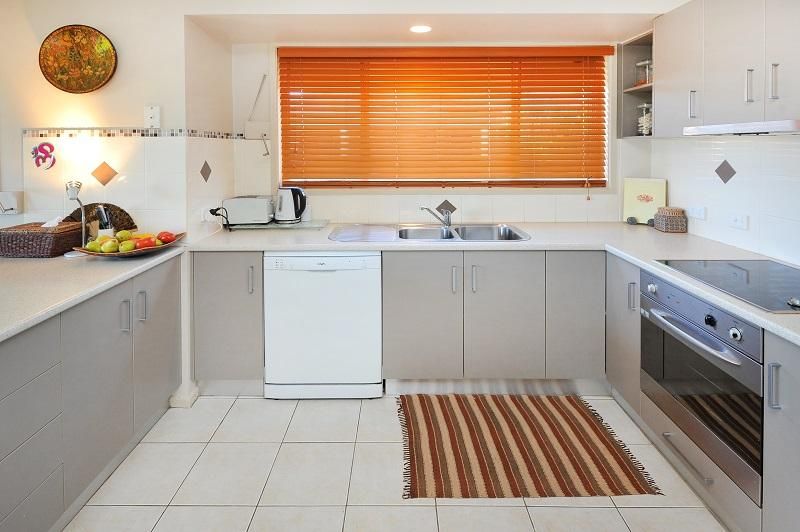 BE IMPRESSED PERFECTLY LOCATED TOWNHOUSE