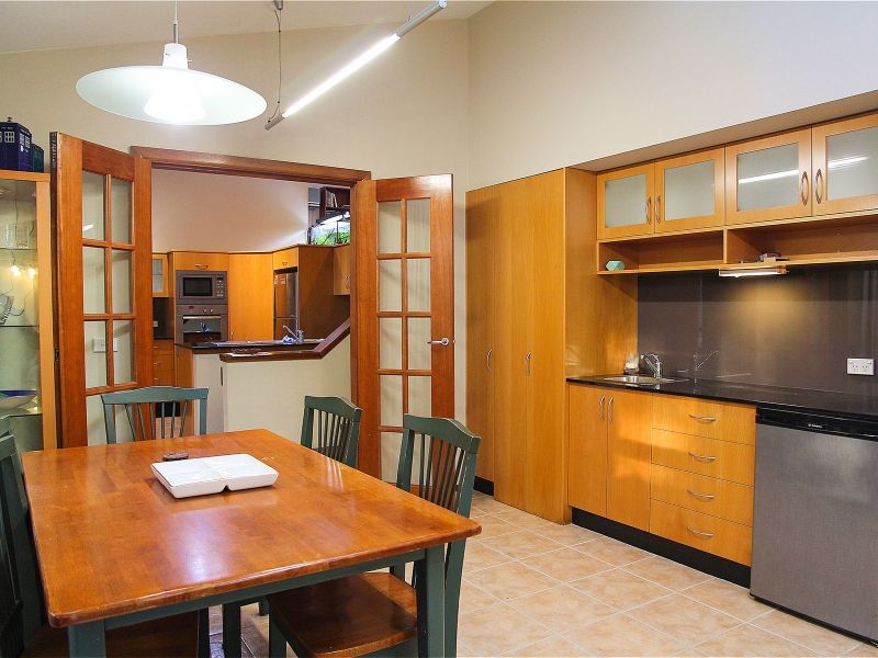 Spacious and private split level four bedroom home in peaceful bushland location