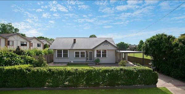 Spacious split level home in sought after location, 1 minute drive to highway and minutes to Singleton Square shopping centre, Aldi and IGA