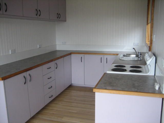 Comfortable Family Home or Investment Property with lovely low-maintenance garden and water views