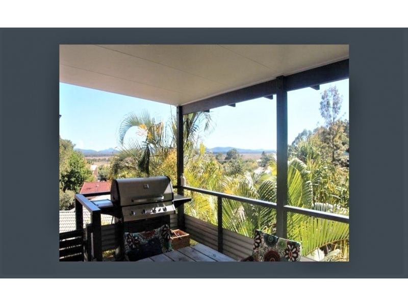 Elevated home with hinterland views